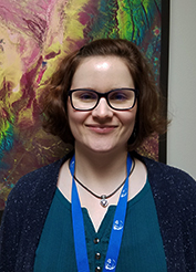 Picture of Eva with a colorful backdrop.